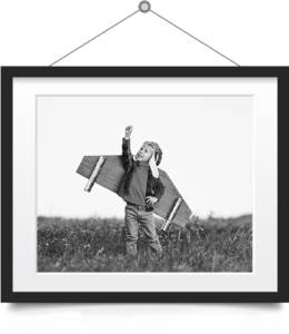 framed photo of child playing